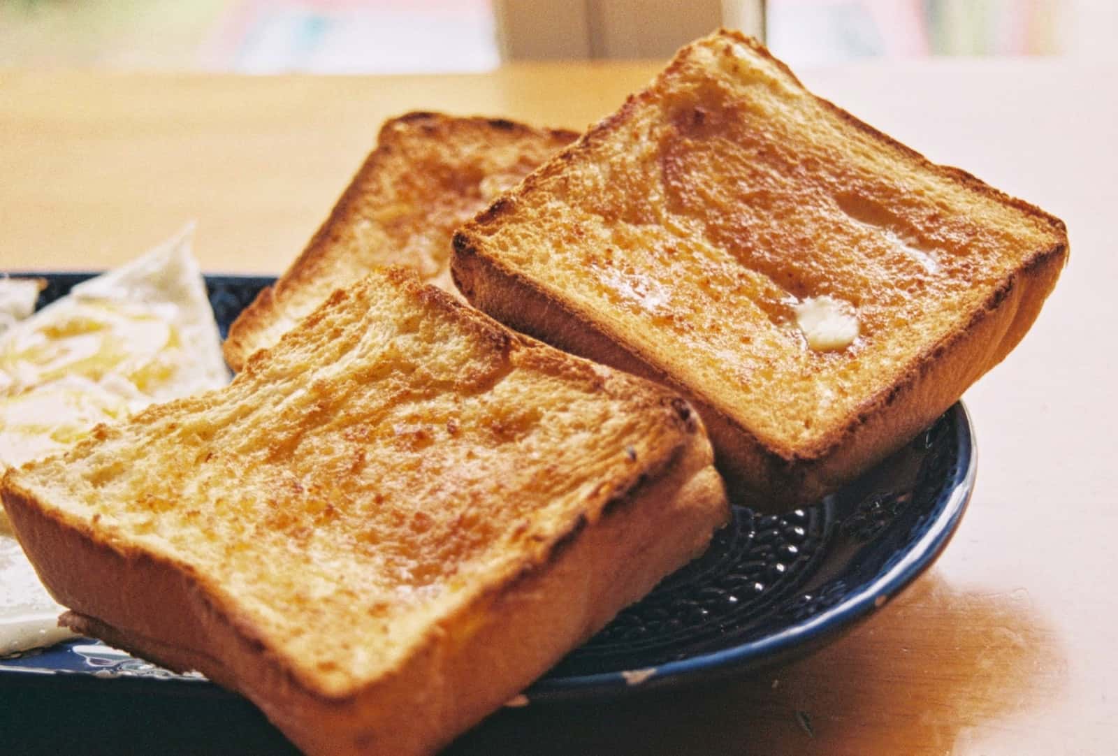 Buttered toasted white bread